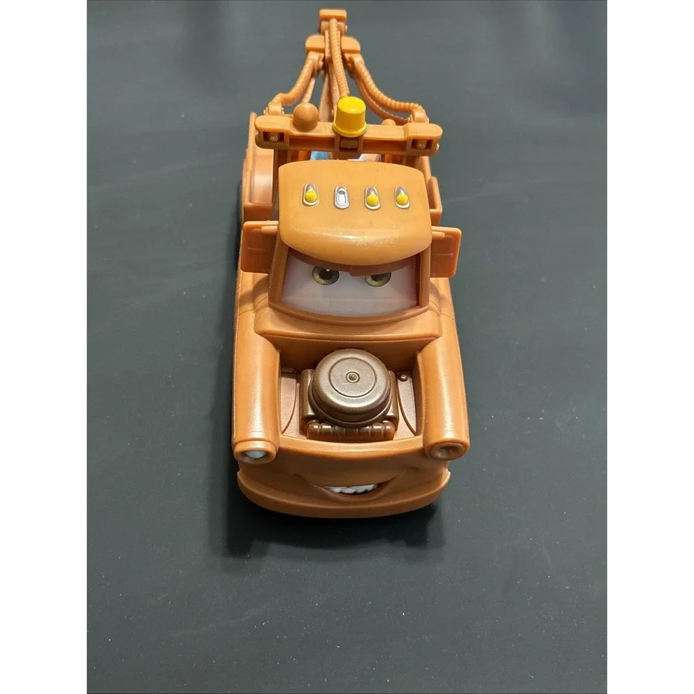 Disney Pixar Cars Lot - Mack Transforming Playset Hauler & Moving Moments Mater